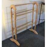 A pine clothes airer with five rails and turned and block supports, 62cm