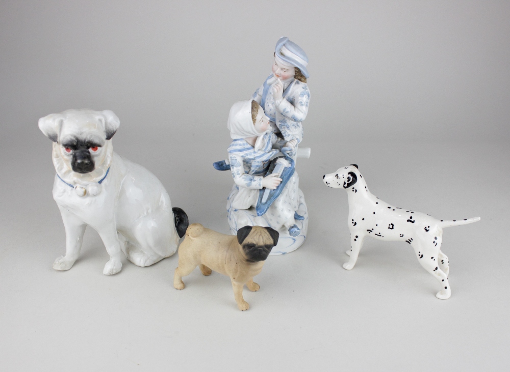 A Plaue porcelain figure group, 18cm high, together with a Beswick model pug 7cm, and Dalmatian 9cm,