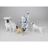 A Plaue porcelain figure group, 18cm high, together with a Beswick model pug 7cm, and Dalmatian 9cm,