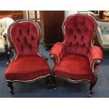 A pair of Victorian button back upholstered ladies and gentleman's chairs, on cabriole legs and