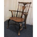 A small Windsor chair, with vase-shaped splat flanked by spindles, and ring turned uprights,