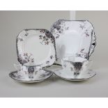 A Shelley porcelain 'black leafy tree' pattern part tea set, comprising cake platter, milk jug,