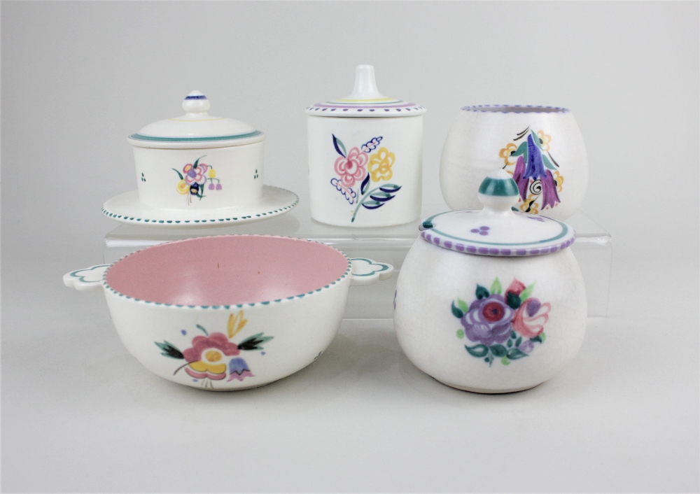 Five items of Poole pottery comprising three various pots and covers, one Carter, Stabler, Adams,