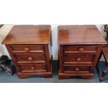 A pair of Willis and Gambier mahogany bedside chests of three drawers, on plinth bases, 50cm