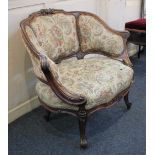 A Victorian three panelled upholstered tub chair with carved wood frame on scroll feet, 85cm