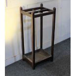 An early 20th century stick and umbrella stand with four section top and metal dish base, height