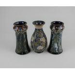 A Doulton Lambeth baluster vase, with floral decoration between beaded borders, artist's initials to