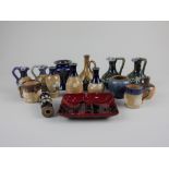 A collection of Doulton Lambeth and Royal Doulton glazed stoneware miniature vases, jugs and other