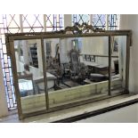 A giltwood and gesso three panelled rectangular wall mirror with scroll surmount (a/f) 112cm