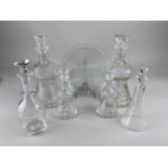 A pair of thistle shaped cut glass decanters with stoppers, 20.5cm a smaller pair of similar