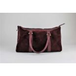A Must de Cartier Boston duffle bag, in burgundy suede, with cover