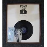 A framed Gracie Fields signed postcard together with a Gracie Fields record sleeve and Decca