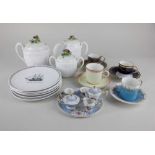 Four Royal Worcester porcelain coffee cups and saucers, together with a Crown Staffordshire