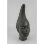 A British Museum replica Benin composite head, stamped BM, 40.5cm high