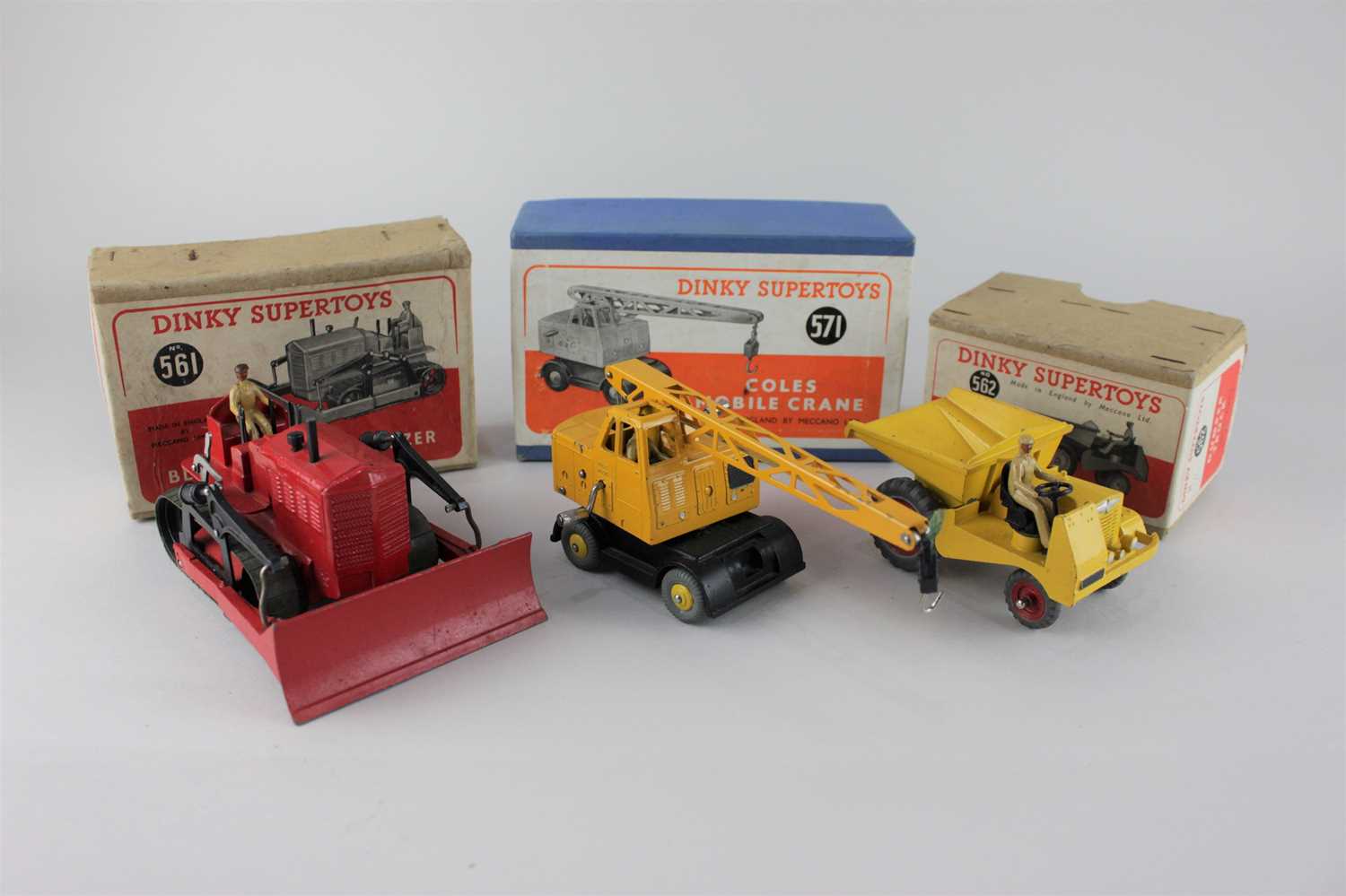 A Dinky Supertoys model No 561 Blaw Knox Bulldozer, No 571 Coles Mobile Crane and No 562 Dumper