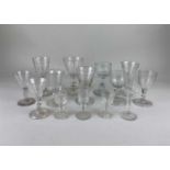 A collection of various 19th century wine glasses to include some etched with grapes and vines