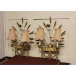 A pair of giltwood and metal two-branch wall lights with wheat sprays, the two scrolling branches