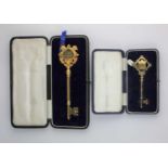 A cased 9ct gold presentation key cartouche handle with presentation engraving, hallmarked