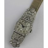 A Gelda platinum cased and diamond set lady's dress wristwatch with a signed circular jeweled