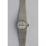 A Rotary white gold and diamond ladies bracelet wristwatch, the signed silvered dial with baton hour