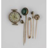 A 15ct gold safety pin, a 9ct gold lady's wristwatch and four various gilt metal stick pins