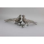 Two pairs of plated models of pheasants largest approx 29cm long, 13.5cm high