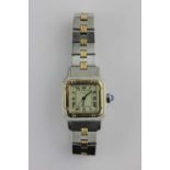A Cartier Santos Galbee lady's 18ct gold and steel automatic bracelet wristwatch, c1980, the