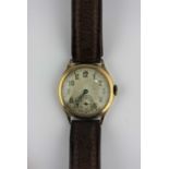 An early 20th century 9ct gold wristwatch with brown leather strap