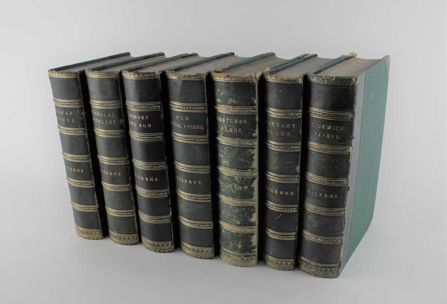 Charles Dickens, seven early volumes including Bleak House, Our Mutual Friend, Dombey and Son with