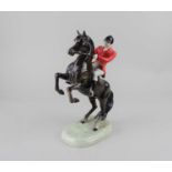 A Beswick figure of huntsman on rearing horse, base stamped 868 (a/f) 23.5cm