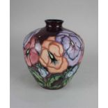 A Moorcroft pottery Pansy pattern baluster vase 18cm high