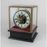 A Eureka Clock Co electric clock in glazed case