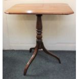 A 19th century mahogany occasional table the rectangular top with canted corners, on turned stem