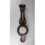 An Edwardian inlaid mahogany barometer and thermometer with bats wing paterae, 69cm high
