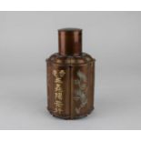 A Chinese lacquered pewter tea caddy of scalloped form, with incised script and decoration 16cm