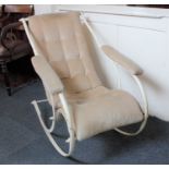 A white painted metal rocking chair in the manner of RW Winfield, with button upholstered slung seat