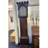 A 19th century oak longcase clock with eight-day movement in arched case, brass dial signed R