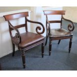 A pair of Regency mahogany carver dining chairs with scroll arms on reeded legs