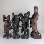 A pair of Chinese carved hardwood and bone figures 46cm high, and two others (4)