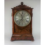 A large William IV mahogany bracket clock, chiming movement, the circular silvered dial with Roman