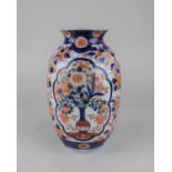 A Japanese Imari porcelain vase, with floral decoration, character marks to base 21.5cm high