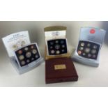 Four Royal Mint UK Executive proof coin sets for 2000, 2001, 2002 Golden Jubillee and 2004 Executive