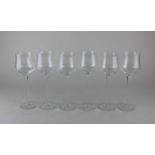A set of six Orrefors style wine glasses each with slender tapered stem