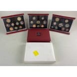 A collection of thirteen Royal Mint UK Deluxe proof coin collections for 1987, 89, 90. 91, 92, 94,