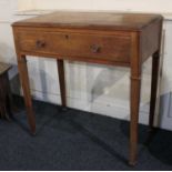 An early 20th century oak side table with moulded edge and single drawer on square tapered legs,