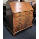 A George III walnut bureau with featherbanded inlay, fitted interior with small drawers and pigeon