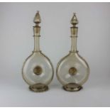 A pair of 19th century Continental, probably Italian glass decanters and stoppers with gold