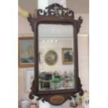 A George III style fret cut wall mirror with spread eagle surmount and inlaid shell base, ht 90cm