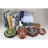 A Ships crest 'Sealion' other ships crests and a small collection of hardback maritime books