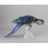 A Royal Dux porcelain model of a parrot 22cm high (a/f)